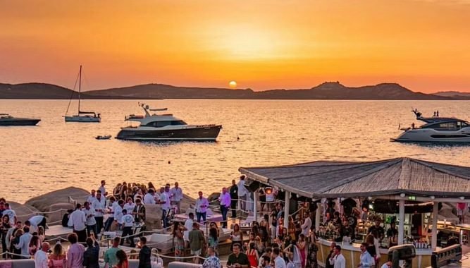 An exclusive beach club at sunset